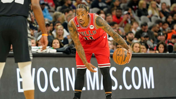 DeMar DeRozan dribbles the ball.